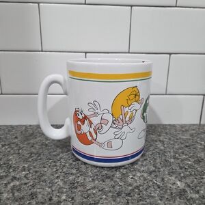 M&M'S Colorful Character Ceramic Mug – White with Yellow, Orange, Green Accents